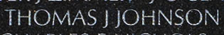 Engraving on The Wall of the name of Specialist Four Thomas J. Johnson, U.S. Army